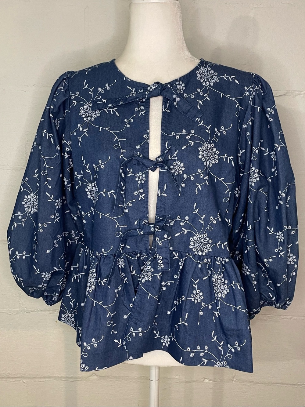 Kaktus Navy Floral Tie-Front Peplum Blouse